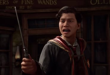 A student holding a wand and looking distressed in Hogwarts Legacy, which topped the final UK boxed sales charts of 2023