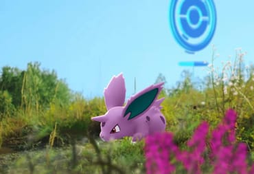 Nidoran walking through the grass with a PokeStop in the background in Pokemon Go