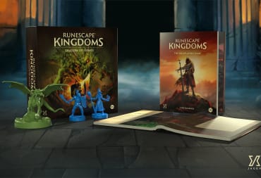 The box and core rulebook for the Runescape Kingdoms board games sitting upright in a dark fog-covered castle corridor.