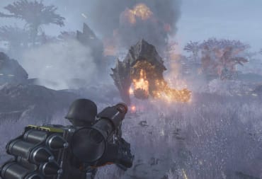 The player character firing a weapon at a Charger in Helldivers 2