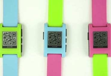 Three Pebble smartwatches in different colors