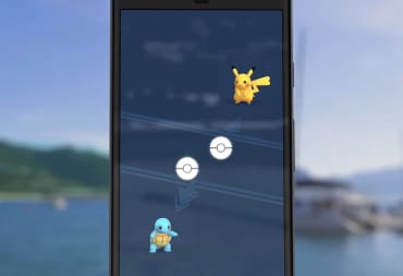 A smartphone showing a Pikachu and a Squirtle being traded in Pokemon Go