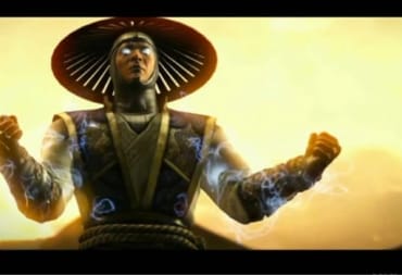 Mortal Kombat X trailer screenshot showing a man in a field-worker hat and white robes standing in a power-stance. 